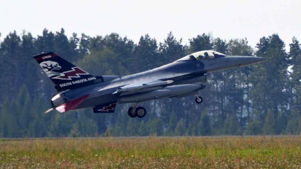 Lask Air Base, Poland -- An F-16 Fighting Falcon from the South Dakota Air National Guard 114th Fighter Wing lands at Lask Air Base, Sept. 3. More than 100 members of the 114FW are deployed in support of Aviation Detachment 16-4, a bilateral training exercise between the U.S. and Polish forces. (U.S. Air National Guard photo by Capt. Amy Rittberger/Released)