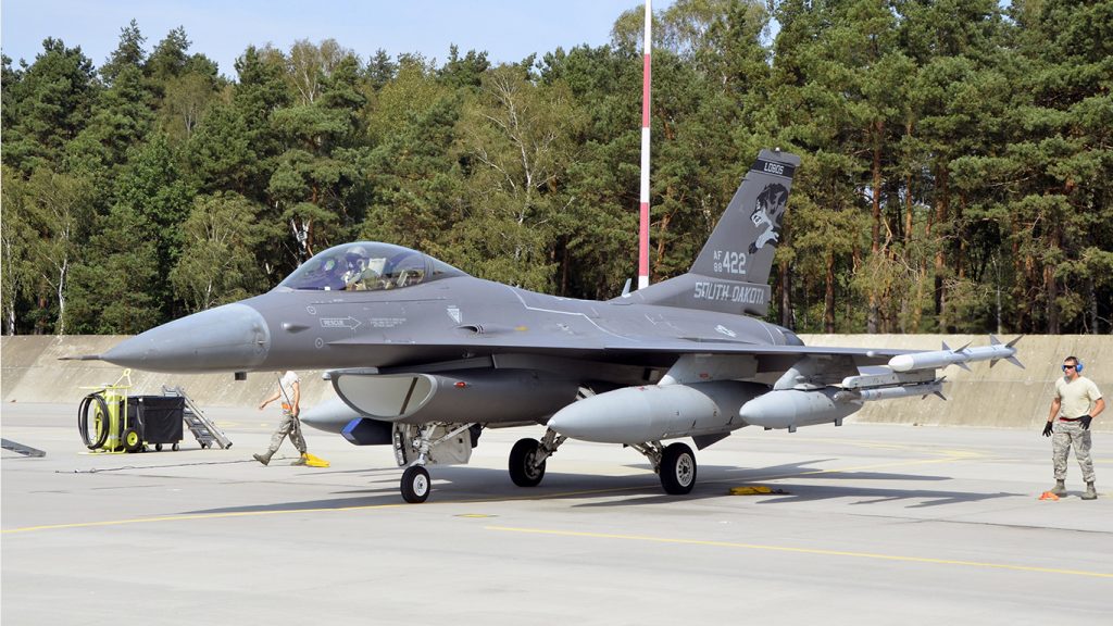 Lask Air Base, Poland -- An F-16 Fighting Falcon from the South Dakota Air National Guard 114th Fighter Wing parks at Lask Air Base, Sept. 3. More than 100 members of the 114FW are deployed in support of Aviation Detachment 16-4, a bilateral training exercise between the U.S. and Polish forces. (U.S. Air National Guard photo by Capt. Amy Rittberger/Released)